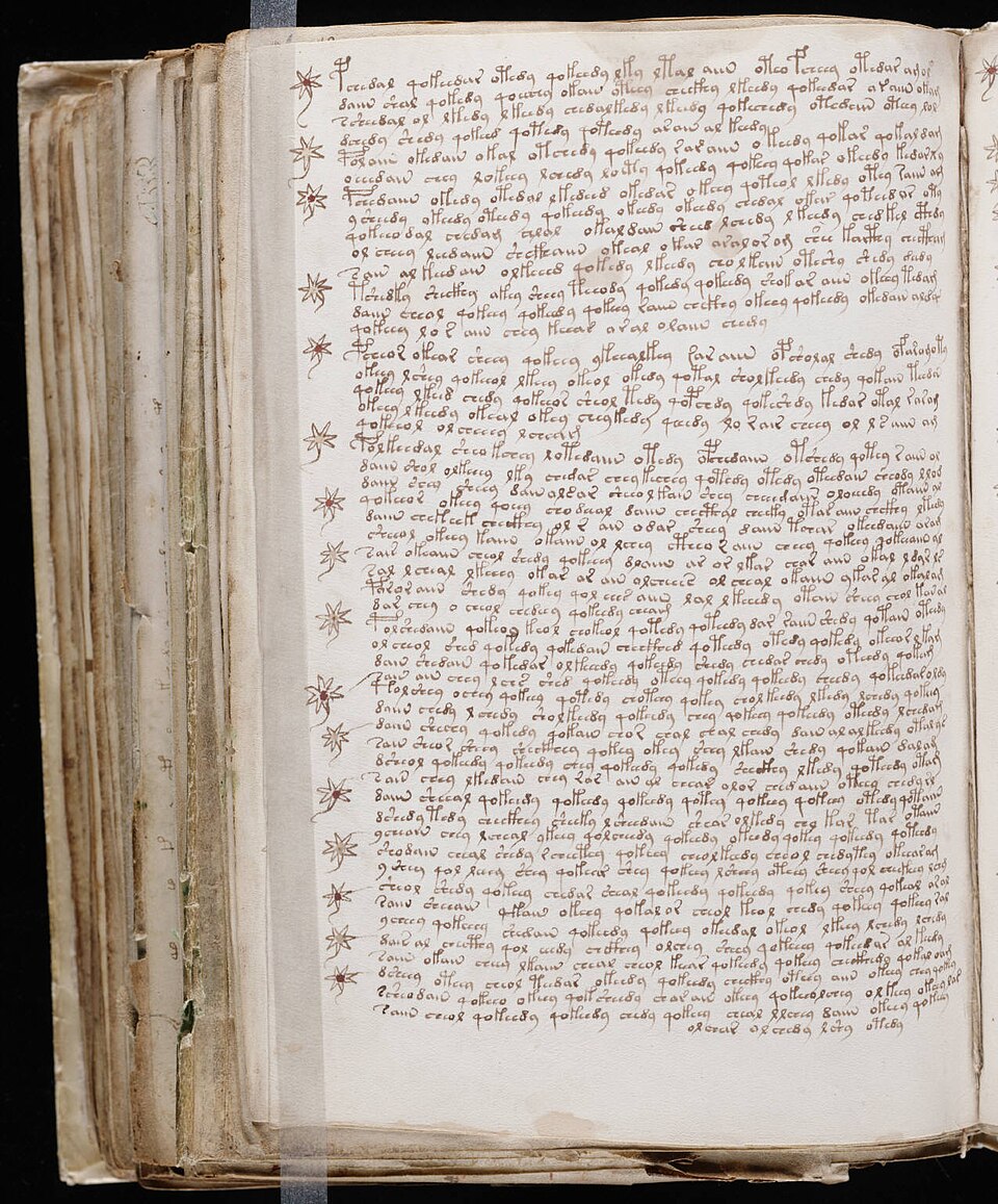 A dense text page from the recipes section of the Voynich manuscript, with star symbols marking paragraphs